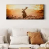 Bricoflor Hirschbild Als Wand Deko Leinwand Bild Mit Hirsch In Sonnenuntergang Idyllisches Wandbild Mit Landschaft Im Winter Für Wohnzimmer Und Flur